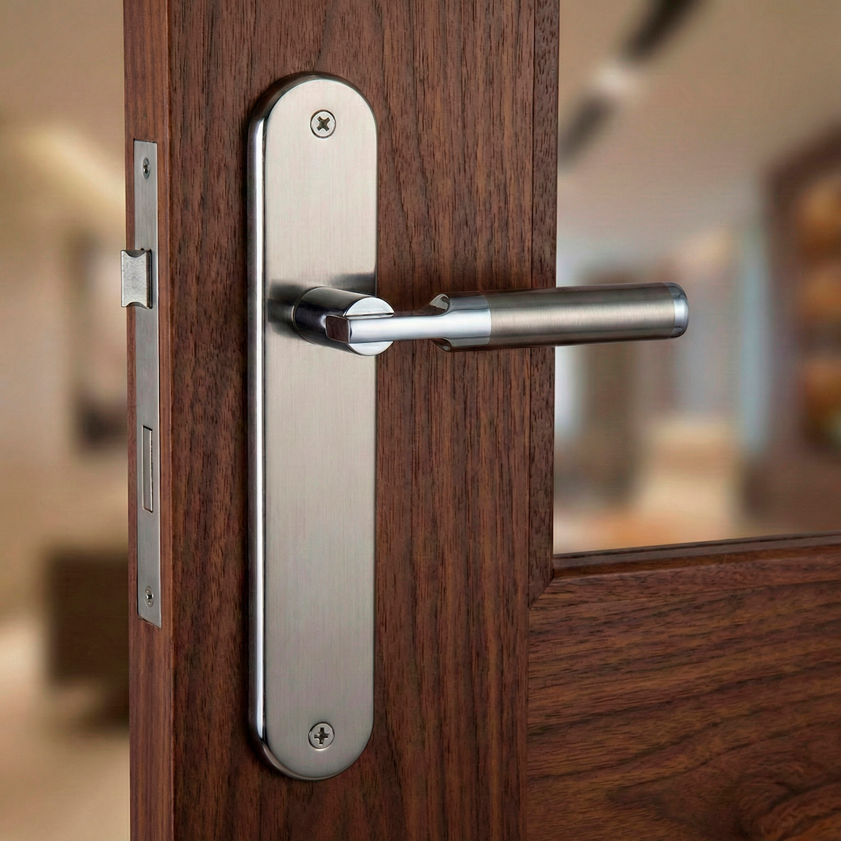 Maniglia modello '1019' d'avanguardia con placca ovale in finitura bicolore per porte