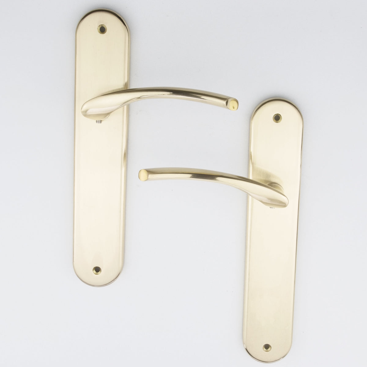 Maniglia in zama modello '556' con placca ovale in finitura oro satinato per porte