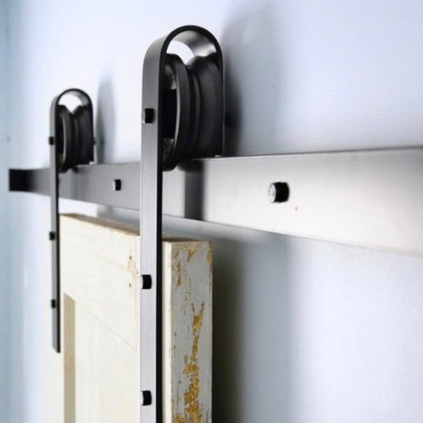 Binari e kit per porte scorrevoli