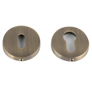 Bocchetta rotonda, ovale e a pera in zama con finitura cuoio opaco ø52 mm per porte