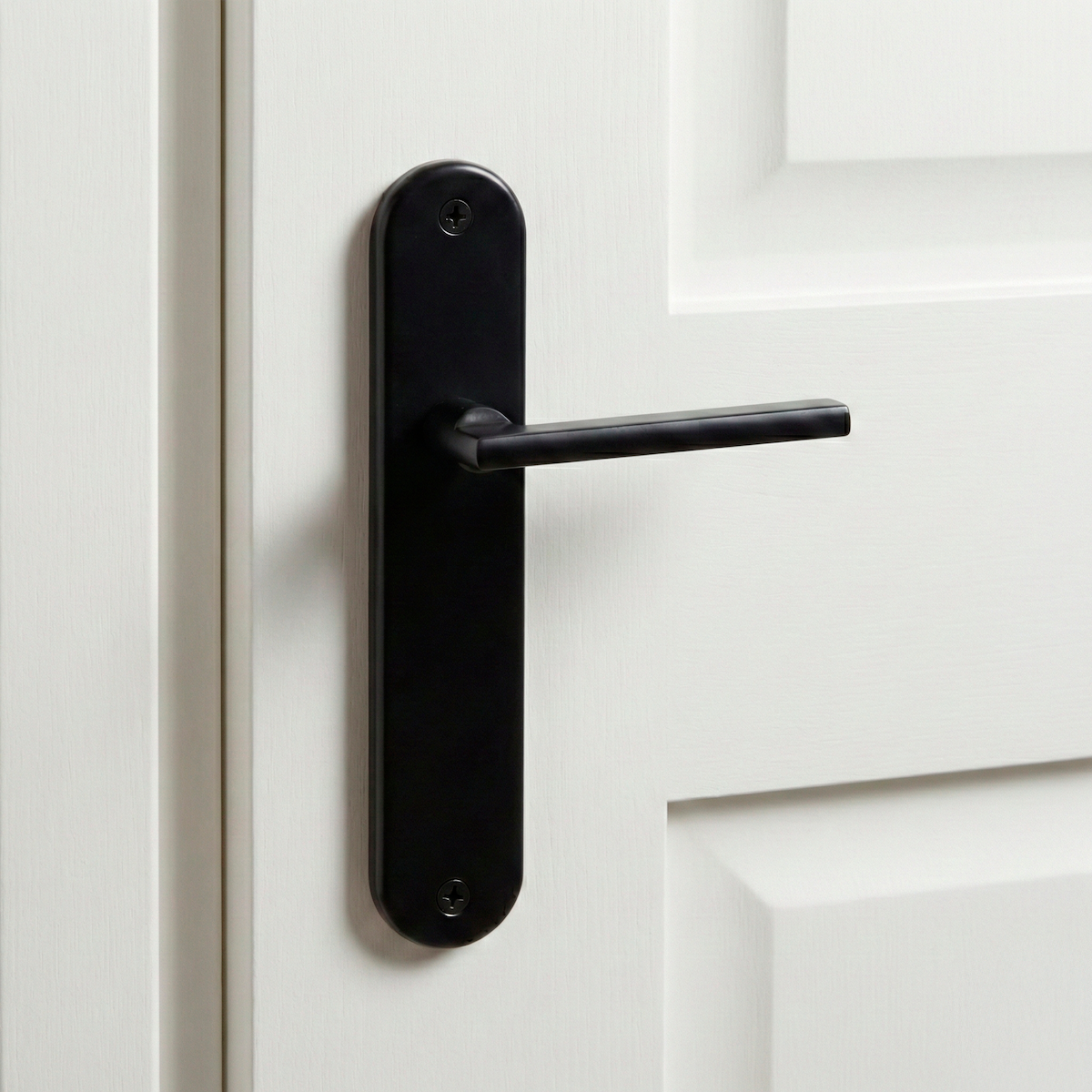 Maniglia modello '530' in alluminio con placca ovale finitura nero opaco per porte